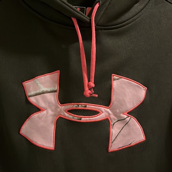 In new condition, under armor olive green with pink camo size large. - Picture 4 of 4